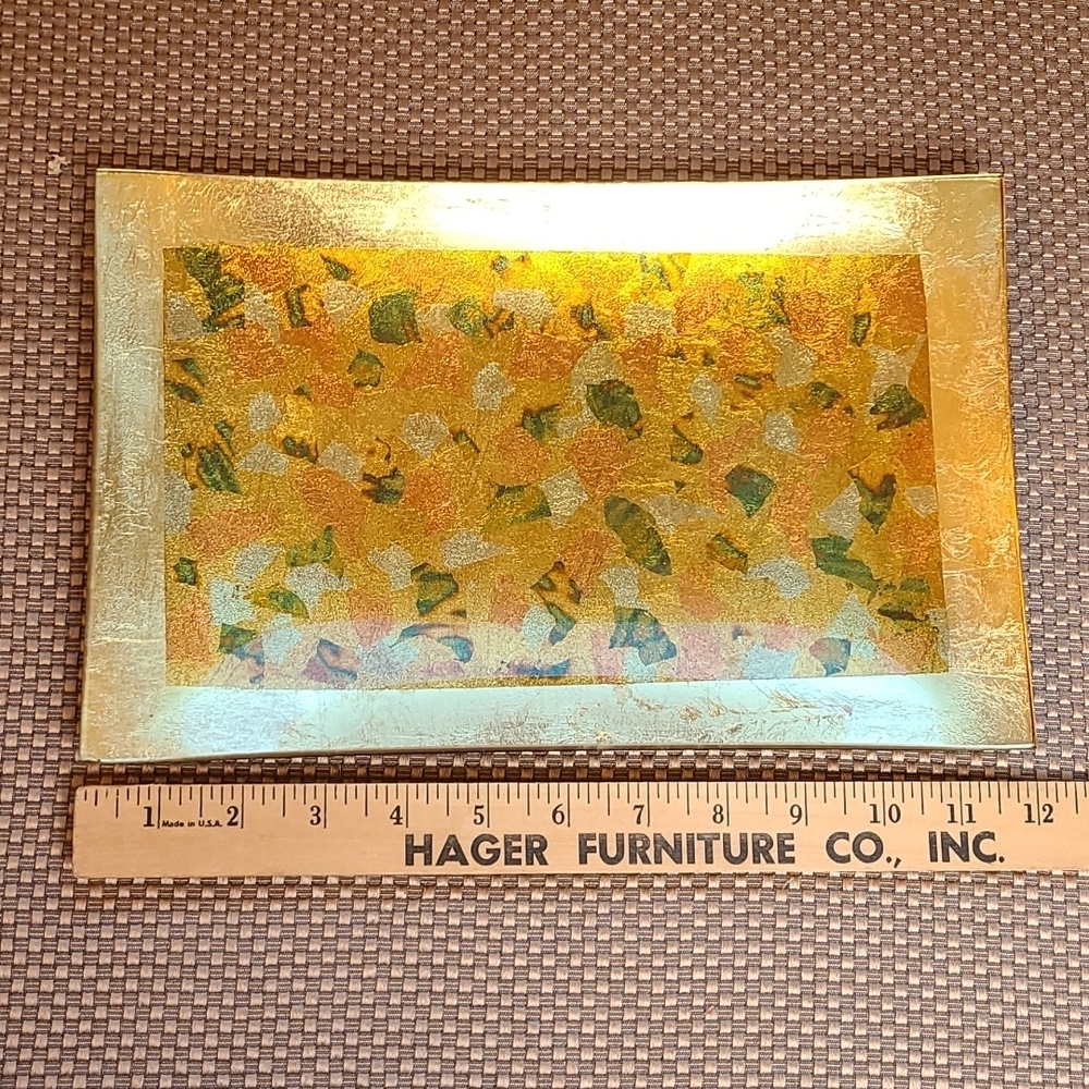 Vintage glass tray, pressed foil design in gold, yellow, orange, and green.